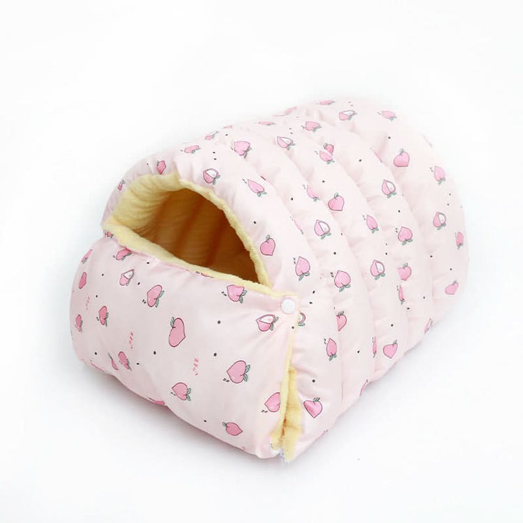 Pink pet bed with pink heart pattern on a white background