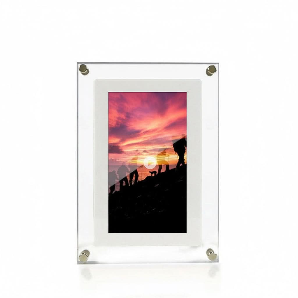 Clear acrylic photo frame with a sunset silhouette design on a white background