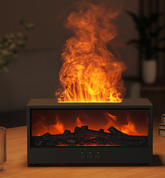 Tabletop fireplace with flames and glowing logs on a wooden surface.