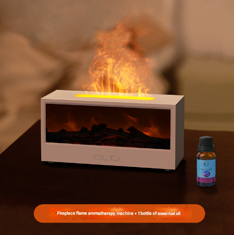 Fireplace flame aromatherapy machine with a bottle of essential oil on a table.