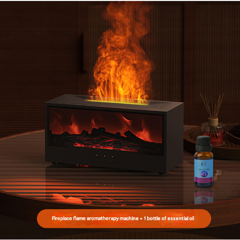 Fireplace flame aromatherapy machine on a wooden surface with an essential oil bottle.