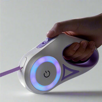Hand holding a futuristic device with glowing elements against a dark background