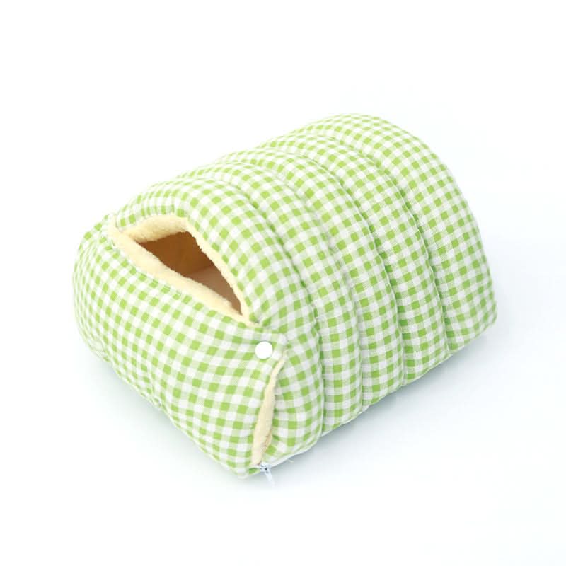 Green checkered pet bed on a white background