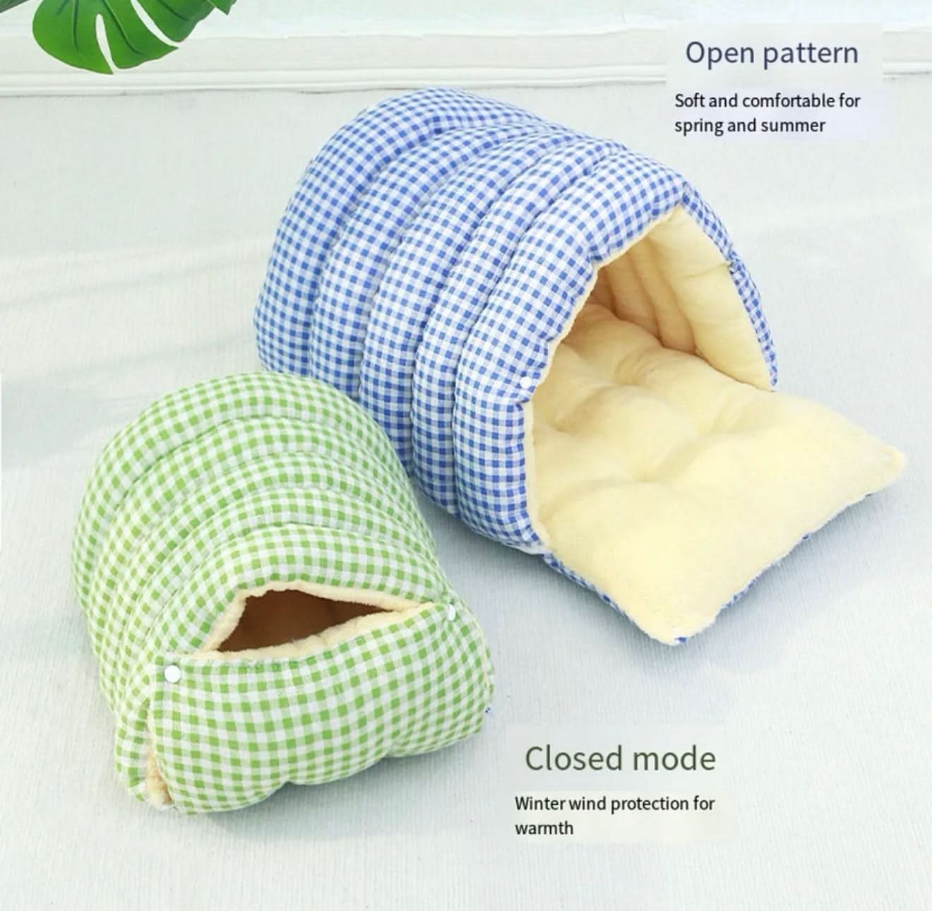 Two pet beds, one green and one blue with white checkered pattern, on a light gray background.