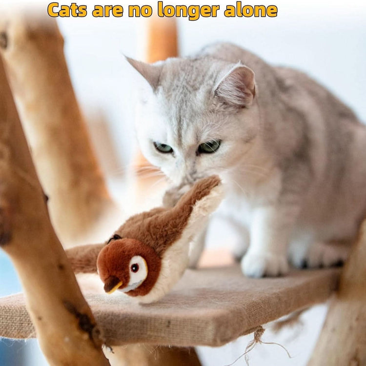 Cat interacting with a bird-shaped toy on a wooden perch