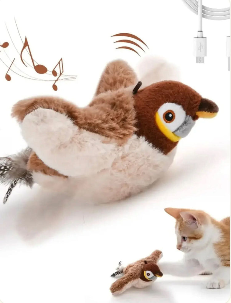 Plush toy resembling a bird with musical notes, on a white background.