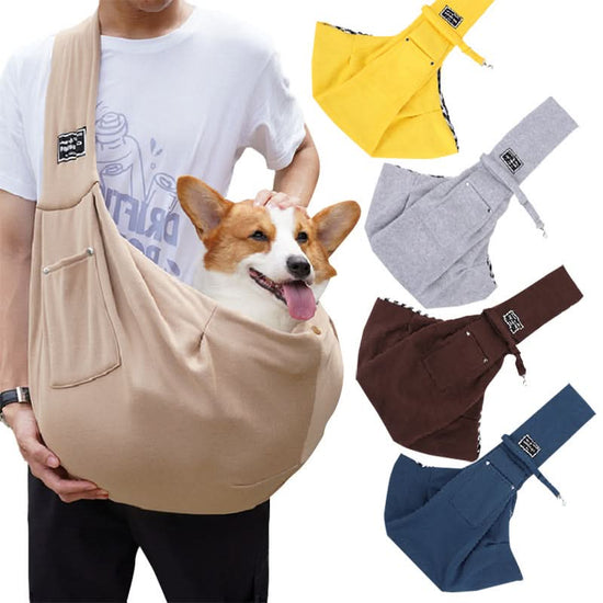 Dog in a beige sling with additional slings in different colors on a white background