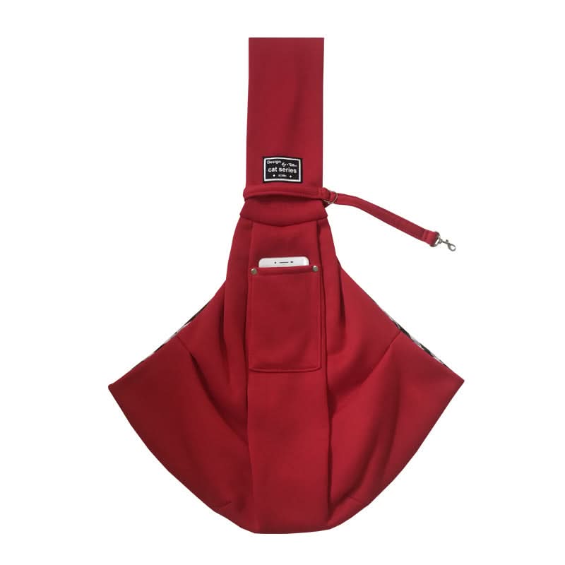 Red bag with a strap on a white background