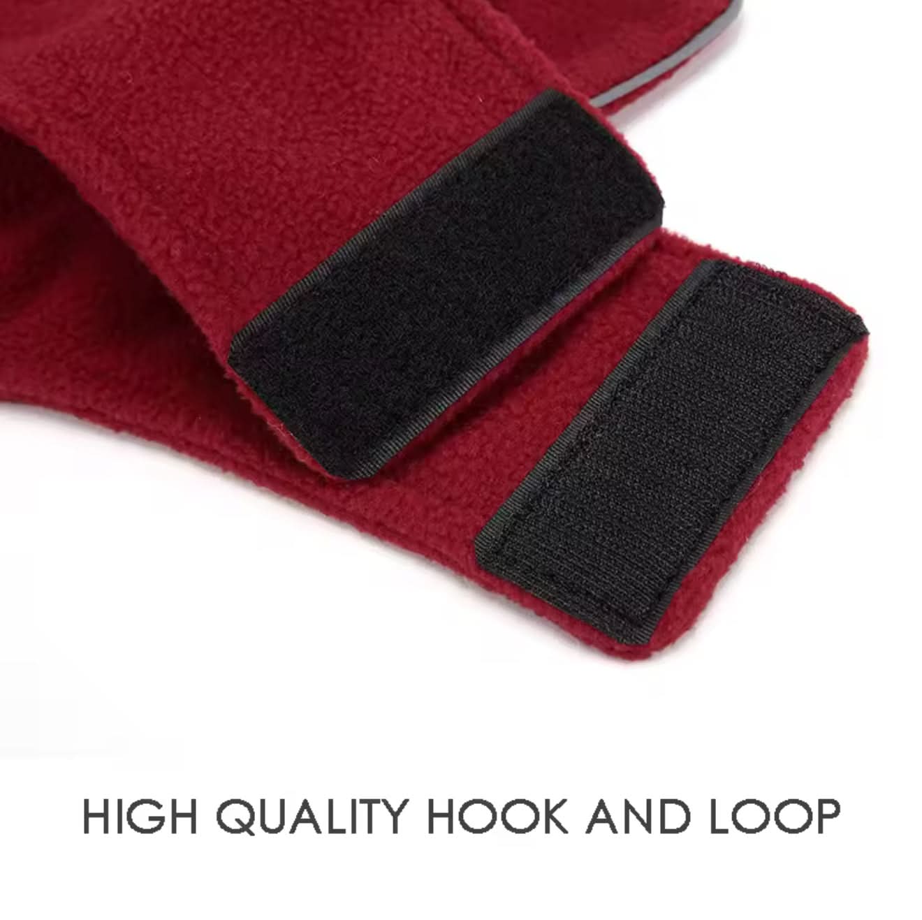 Red fabric with black hook and loop fastener on a white background