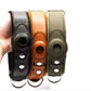 Three leather GPS dog collar holders in black, brown, and green with metal rings.