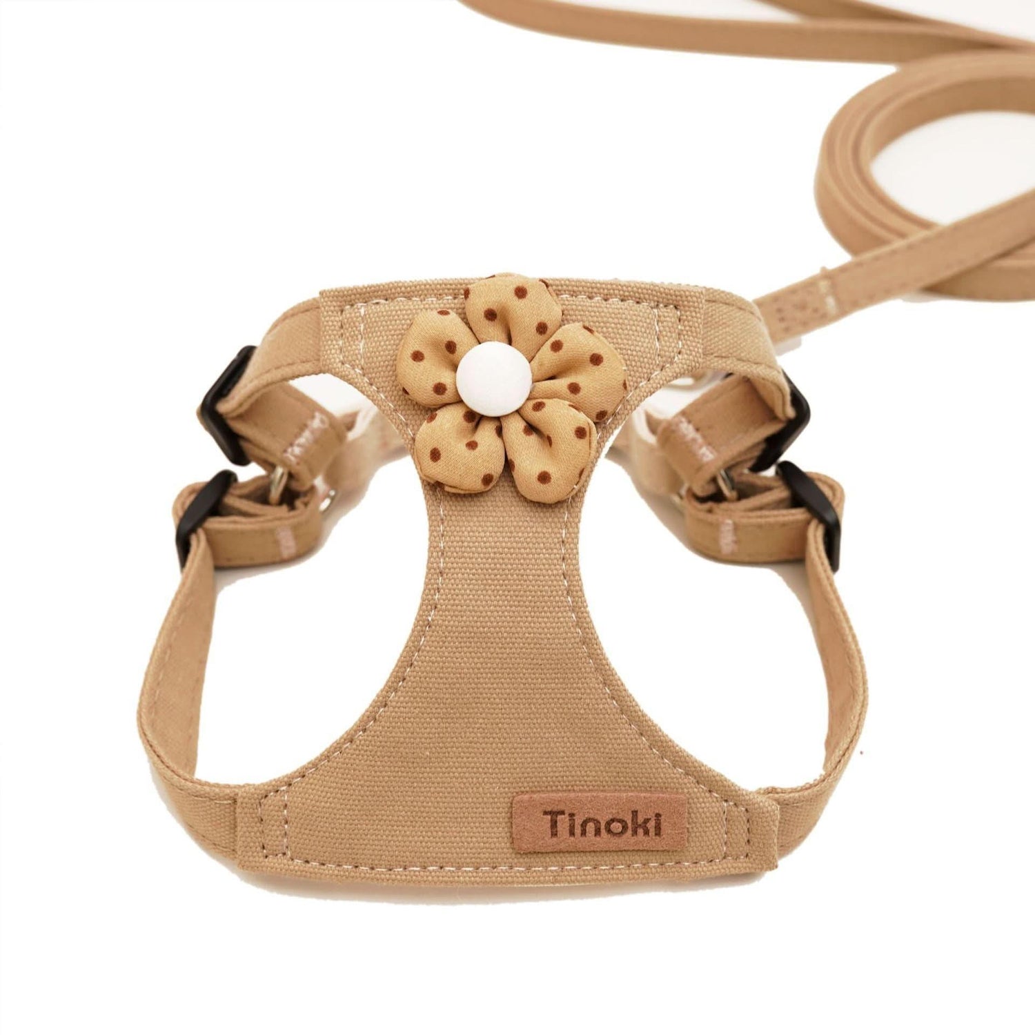 Beige dog harness and leash set with flower decoration and adjustable straps