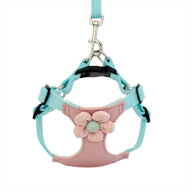 Pastel blue and pink dog harness with leash, featuring a soft flower detail on chest
