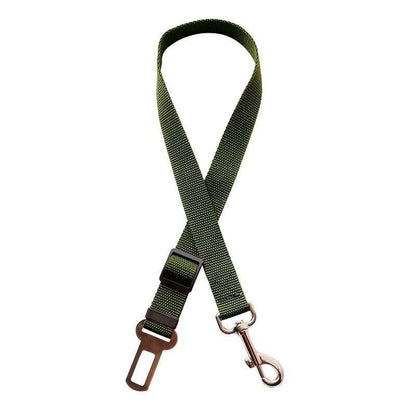 Adjustable green dog car seat belt with metal clip and buckle on white background