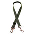 Adjustable green dog car seat belt with metal clip and buckle on white background