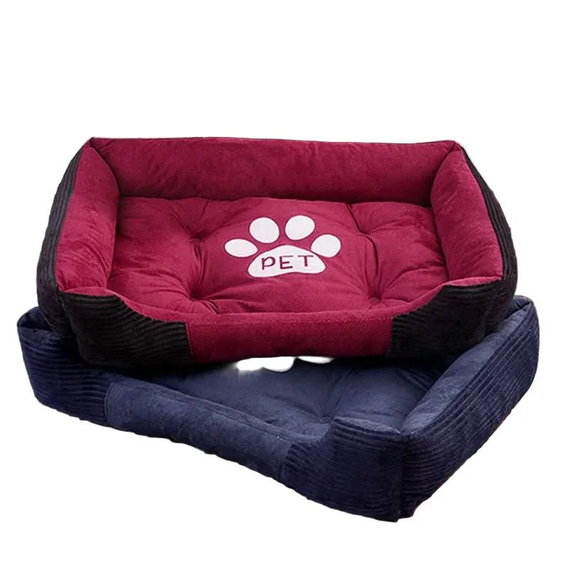 Stacked plush rectangular pet beds for dogs and cats in red and blue with paw print design.