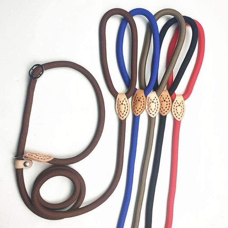 Assorted pro rope dog collars and leashes in brown, blue, olive, black, and red on white background