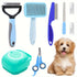 8-piece stainless steel dog grooming kit with brushes, combs, nail clippers, and puppy
