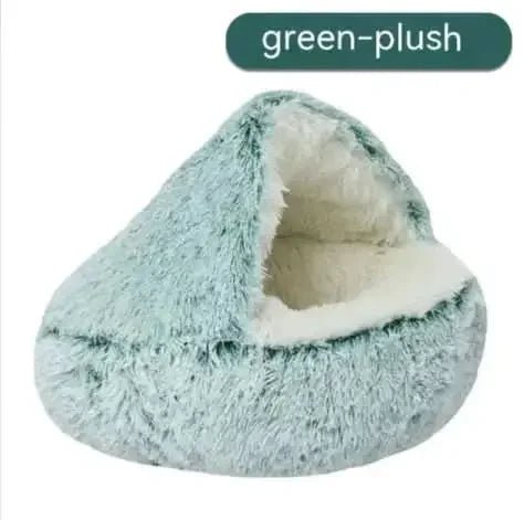 Semi-closed green plush pet bed with soft, cozy interior and cave shape