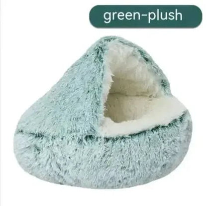 Semi-closed green plush pet bed with soft, cozy interior and cave shape