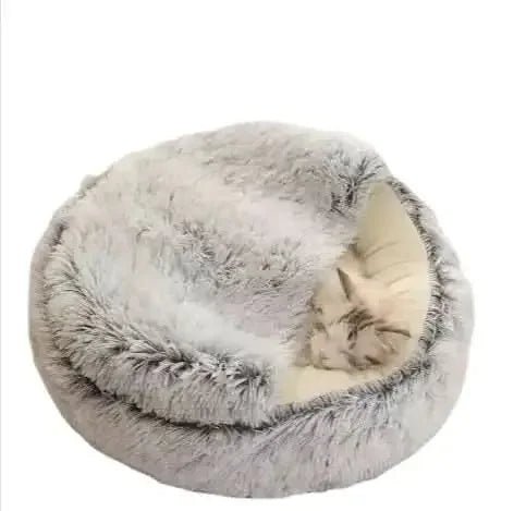Fluffy semi-enclosed pet bed with a cat sleeping inside, cozy and soft design