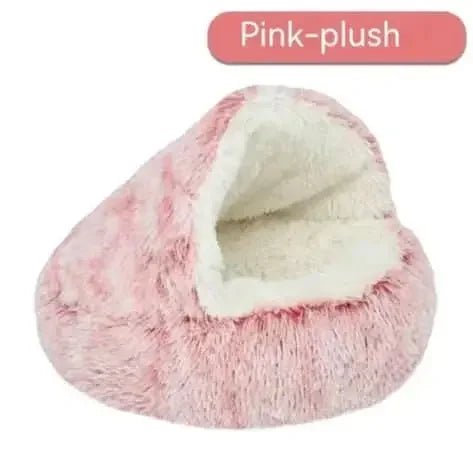 Semi-closed pink plush pet bed with soft, cozy interior for cats or small dogs