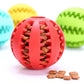 Red silicone pet toy ball filled with kibble, interactive chew toy for dogs and cats
