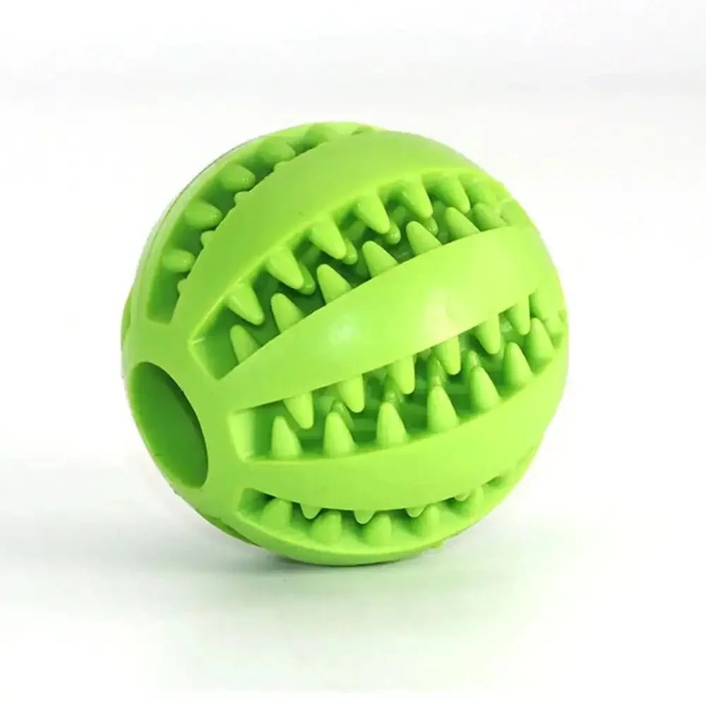 Green silicone pet toy ball with textured grooves for interactive dog play